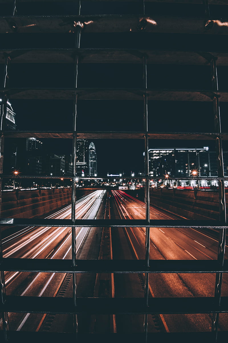 time-lapse of road with light streaks view behind grills, HD phone wallpaper