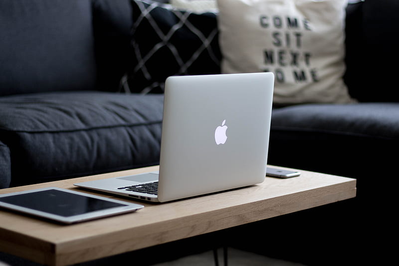 MacBook Air on brown wooden center table, HD wallpaper