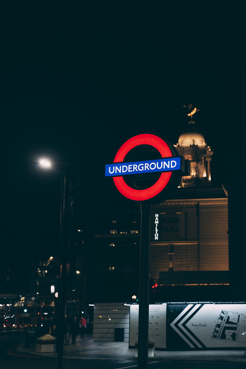 Underground LED signage on post at the city during night, HD phone wallpaper